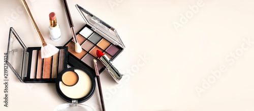 Cosmetics set closeup, makeup items collection, beauty products arrangement closeup empty space background.