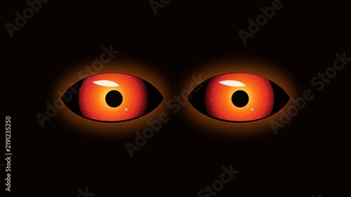 Multiple glowing orange eyes staring from the dark for halloween