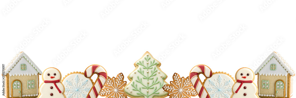 Naklejka premium Christmas holiday gingerbread cookie bottom border with snowman tree candy cane and house for web header design