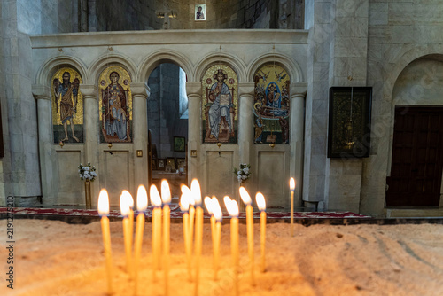 Konstfotografi votive candles lit by believers, Kutaisi Cathedral (Cathedral of the Dormition),