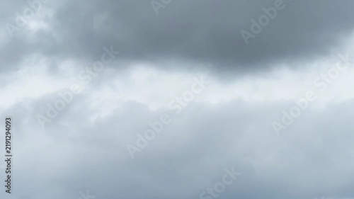  timelapse clouds, moving clouds, fluffy clouds drifting across a dark blue sky, vertical video