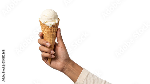 Foto Vanilla ice cream scoop melting slightly on a waffle cone is raised upward in is