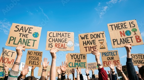 Global Climate Strike Protest with People Holding Cardboard Signs for Environmental Protection and Planet Awareness