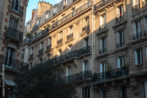 Parisian haussmann architecture with balconies and classic facades, capturing the charm of urban living in paris, france