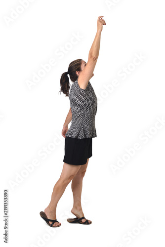 Woman grabbing or reaching for something high up, against a white background.(hook-shaped finger)