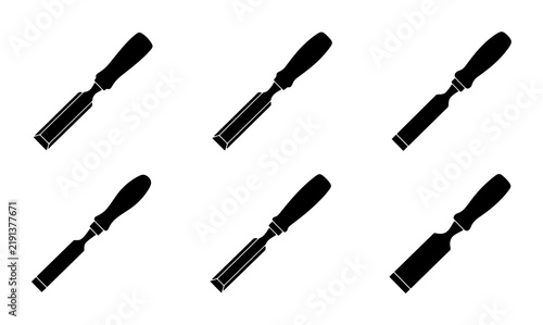 Foto Black chisels set, woodworking tools, industrial background