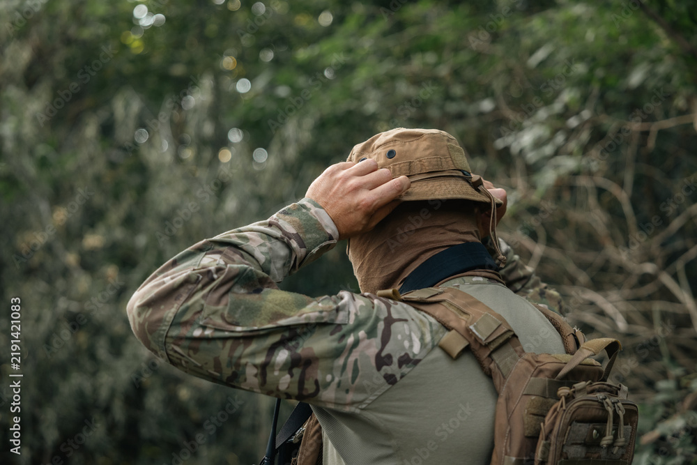 Fototapeta premium Portrait of a soldier in combat conditions