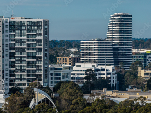 Fotografie Contemporary residential towers clustered in northwest Sydney, with modern apart