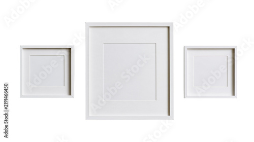 Foto Three square white wooden picture frames with matting boards