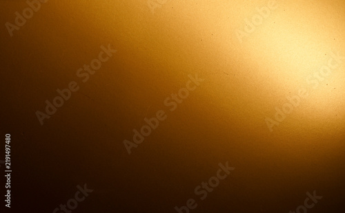 A beautiful golden gradient background with subtle texture and bright highlight.