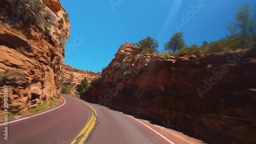 Zion National Park POV Drive Below Sheer Sandstone Wall Utah