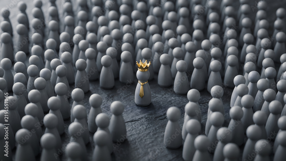 Obraz premium Leadership concept with crowned figure standing out from crowd of grey pawns