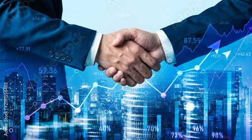 Businessmen Handshake with Stock Market Graph and City Skyline Background
