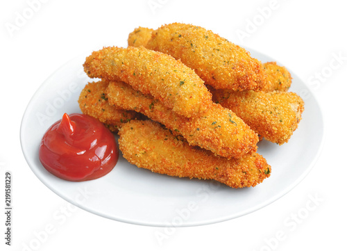 фотографія Fish fingers sticks with ketchup isolated on white background.