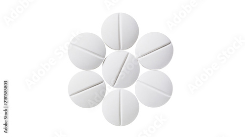 Cuadro en lienzo Seven round white medicinal pills arranged in a flower shape pattern