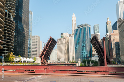 Chicago, Illinois, United States - August 24, 2014: Urban landscape featuring raised movable bridges with the Chicago skyline in the background.