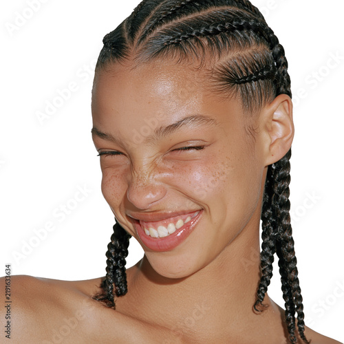 Braided teenage girl smiling in profile