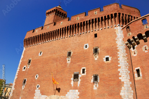 Castillet historic city gate in Perpignan France, medieval fortress and iconic Catalan landmark with red brick architecture and museum