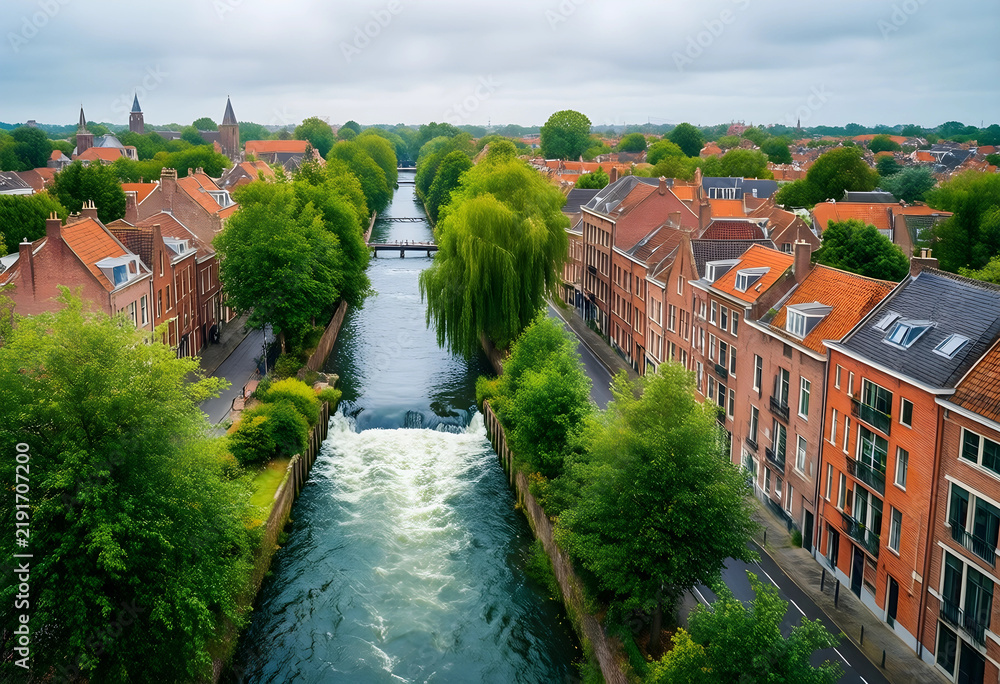 Fototapeta premium Urban tourism and travel destination, historic canal city with traditional brick architecture and flowing water in a scenic European town landscape