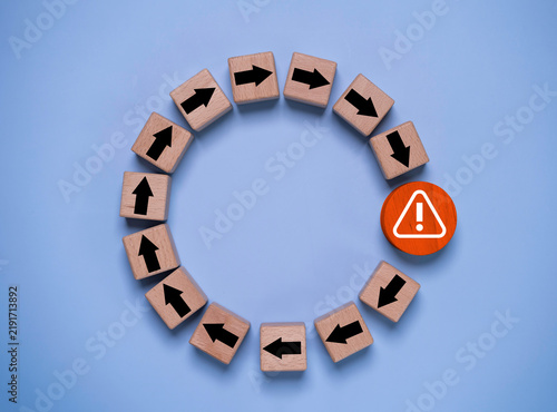Circular arrows interrupted by a warning symbol represent process disruption, risk, workflow failure, business obstacle, operational problem, crisis management and need for corrective action.