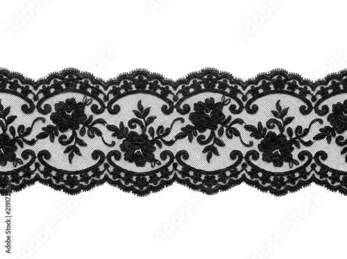 Black lace trim features intricate floral patterns against a neutral background.