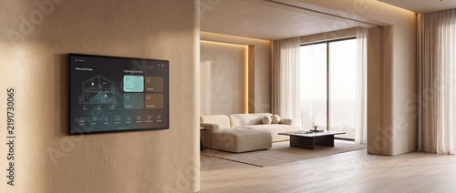 Smart home control panel on wall in a modern minimalist living room with beige plaster texture, displaying climate and lighting automation interface for luxury residential interior design