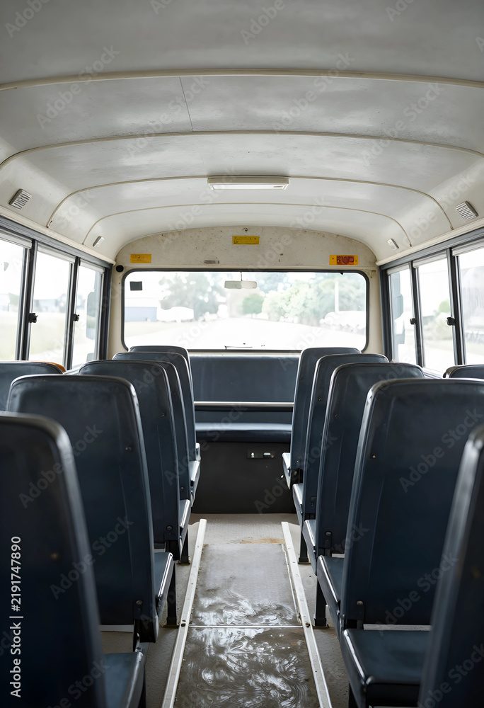 Obraz premium Public transportation and urban mobility, empty bus interior with rows of seats and aisle for daily commute and city travel in a passenger vehicle
