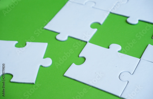 Photography An incomplete puzzle, with some pieces missing, symbolizes incompleteness, imperfection, mystery, or loss