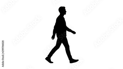 Silhouette of person walking forward