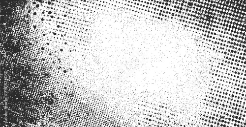 Monochrome grunge halftone texture background with distressed speckled pattern 