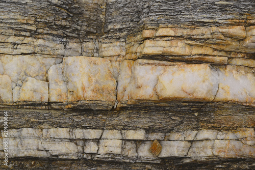 Canvastavla Multiple rock strata, with different mineral compositions, arranged in layers, revealing the different geological periods in the Earth’s crust