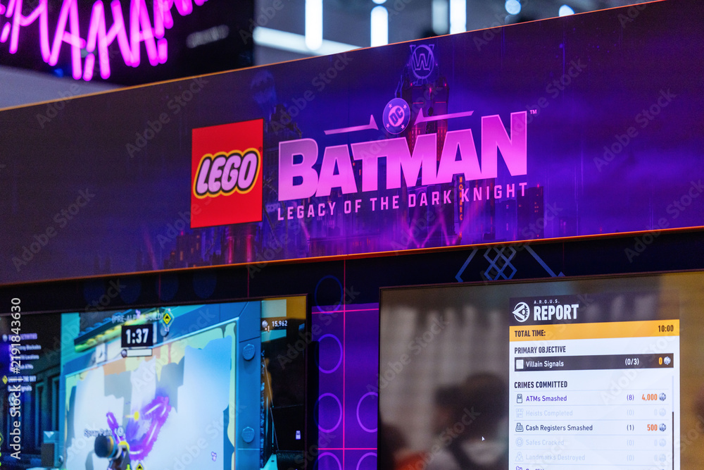 Obraz premium Cologne, Germany - August 26, 2026: LEGO Batman: Legacy of the Dark Knight game display at gamescom featuring gameplay statistics and vibrant branding elements