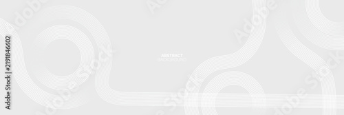 Abstract wide banner design with white concentric line circles on light gray background.