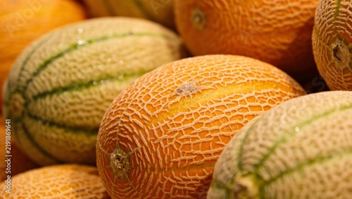 Melons displaying fresh textures and vibrant colors