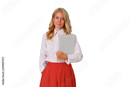 Mature businesswoman standing and holding a laptop, representing confidence, business, leadership, and entrepreneurship. Transparent background