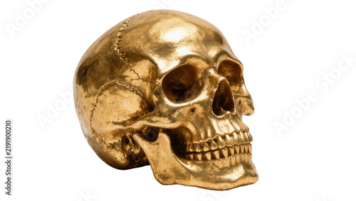 Foto Shiny golden human skull sculpture, isolated on transparent background