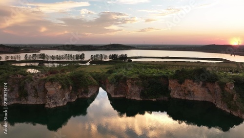 Fotografía Quarry water hole landscape at sunset