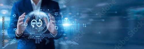Plakat Engineer holding glowing dashboard DevOps integrating development and operations for faster delivery. Automation improves workflows enhancing system reliability and continuous deployment efficiency.