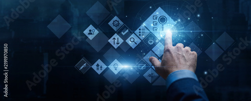 Quality assurance manager touch network interface conducting corporate Assessment to track performance metrics and risk evaluation graph on hologram screen. Business strategy and system review.