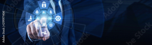 IT manager point of Access Management dashboard on virtual screen, controlling user permissions, secure login and identity protection. Access Management strengthens security and system control.