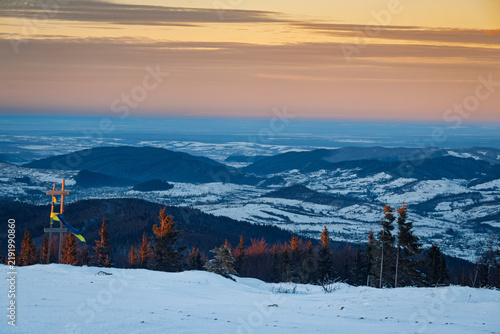 Winter sunset with a view of the Montenegrin ridge of the Ukrainian Carpathians