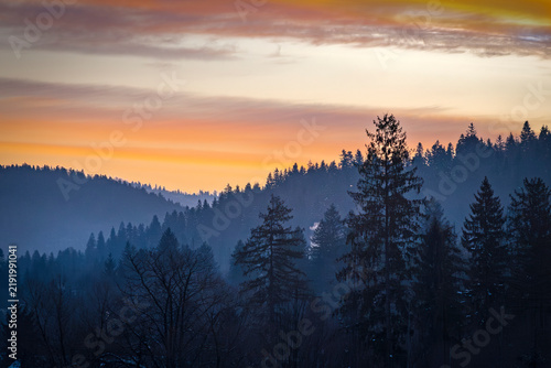 Winter sunset with a view of the Montenegrin ridge of the Ukrainian Carpathians