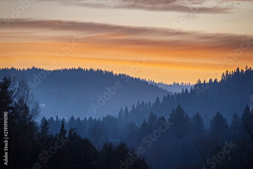 Winter sunset with a view of the Montenegrin ridge of the Ukrainian Carpathians