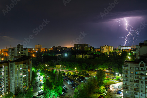 Lightning and a stormy sky over the city at night