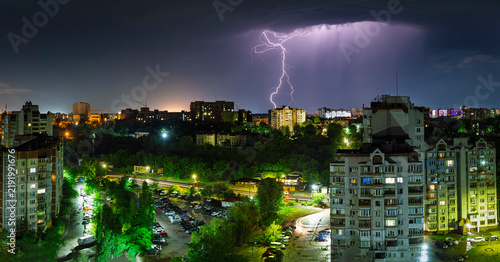 Lightning and a stormy sky over the city at night