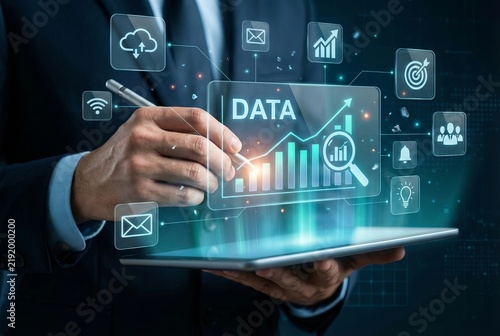 Businessman analyzing financial data chart hologram with stylus on digital tablet