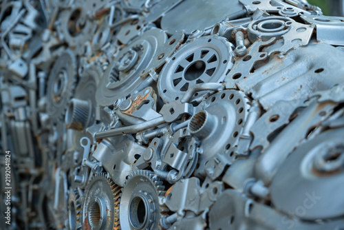 Close-up of welded metal parts forming a compact unit.