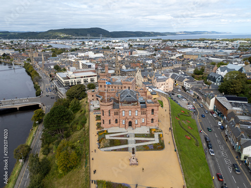 High wide aerial view of Inverness Castle, River Ness, Ness Bridge, Kessock Bridge, and Beauly Firth in Inverness-shire, Scottish Highlands, Scotland