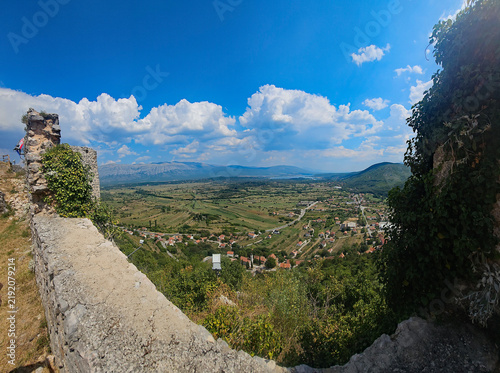 Wonderful photos of a stunning landscape in Croatia, featuring sweeping views, arid terrain, and endless expanses with water and buildings