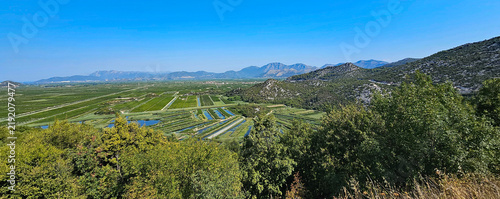 Wonderful photos of a stunning landscape in Croatia, featuring sweeping views, arid terrain, and endless expanses with water and buildings
